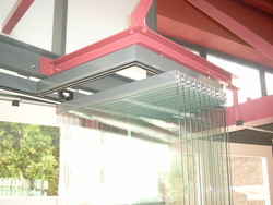 KCS frameless glazing system with parking